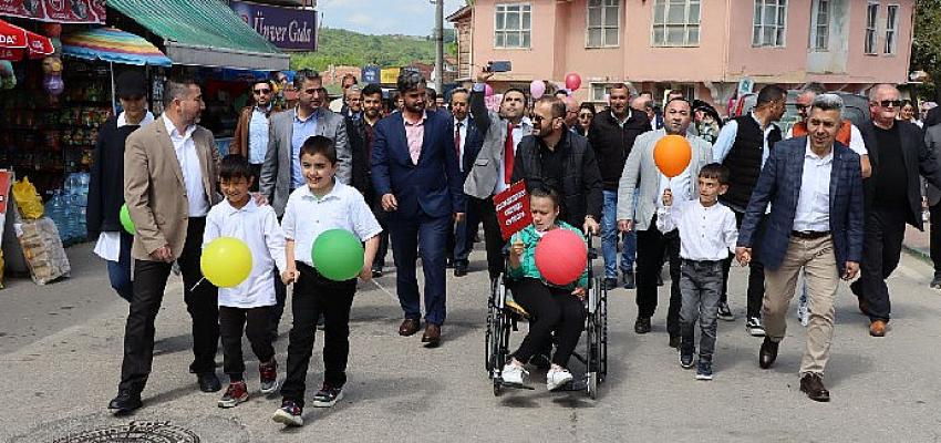 Başkan Turan engelliler farkındalık yürüyüşüne katıldı